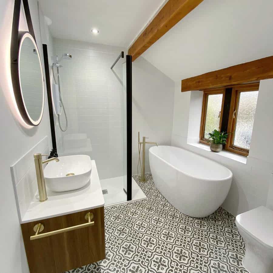 Modern white bathroom with patterned floor and wood accents