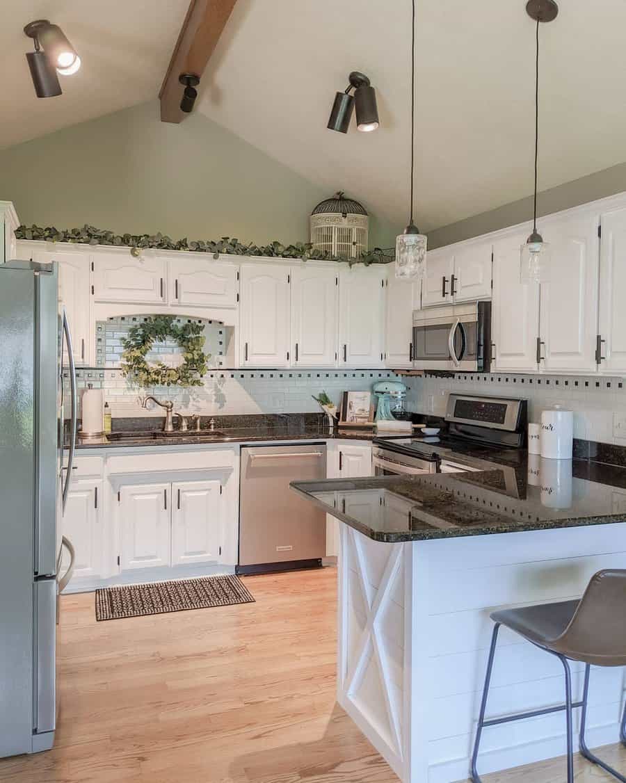 White cabinets with marble countertops