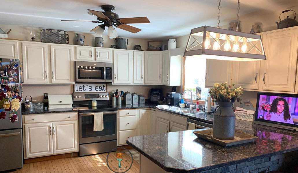 White cabinets with marble countertops