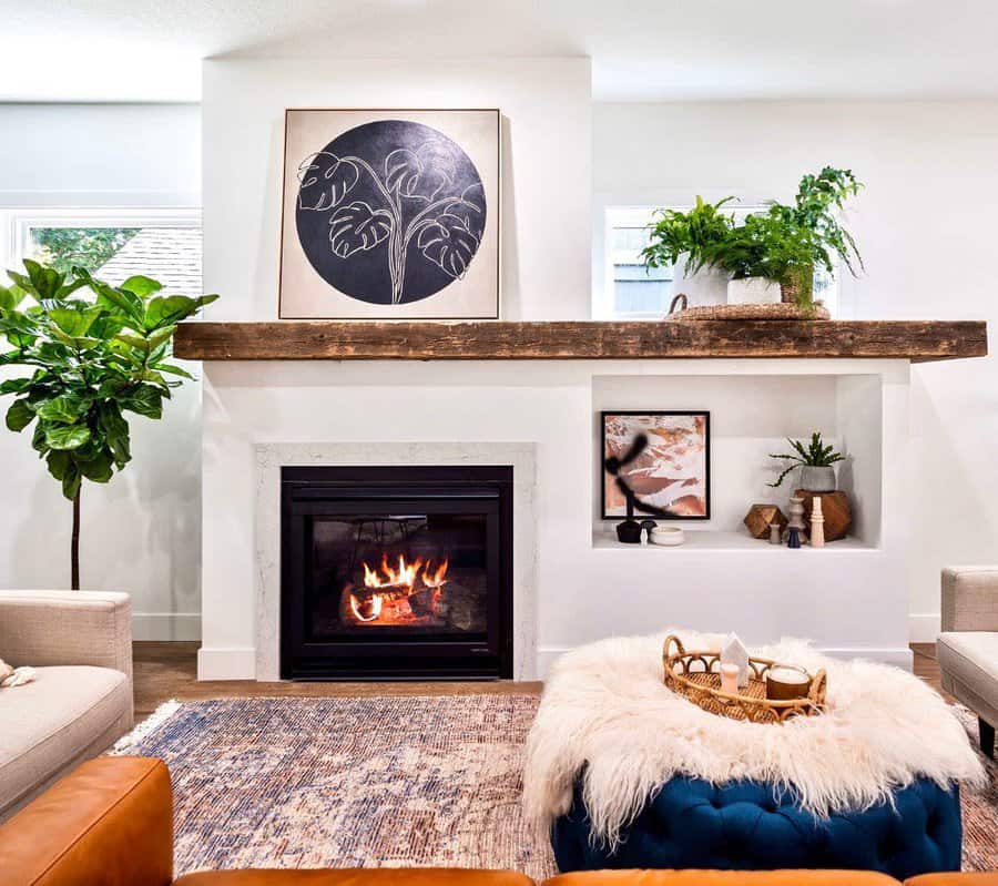 Inviting living room with fireplace and greenery