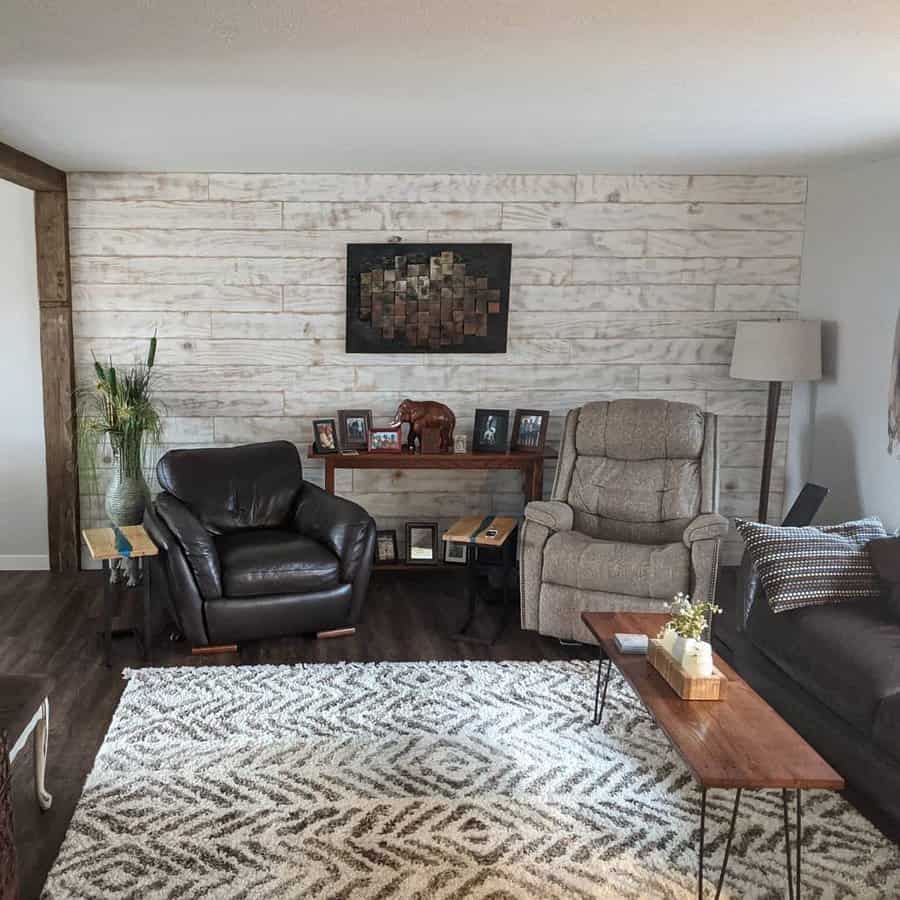 Cozy living room with whitewashed shiplap wall and rustic accents