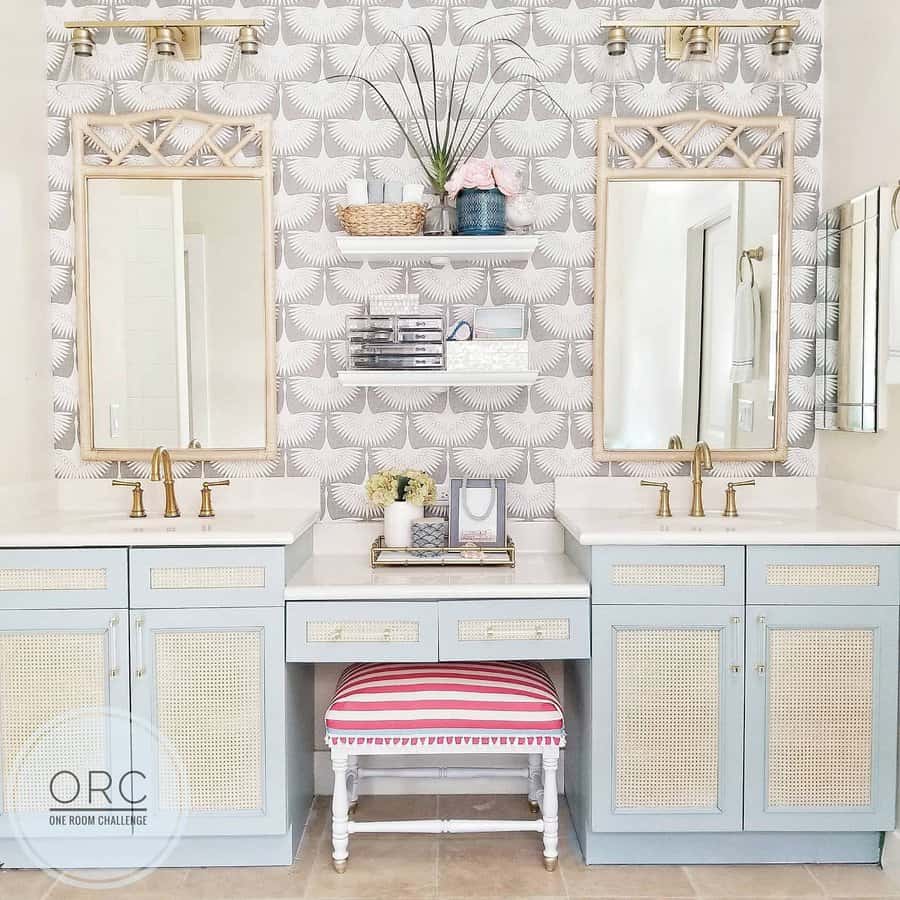 Double vanity with bamboo details and patterned wallpaper