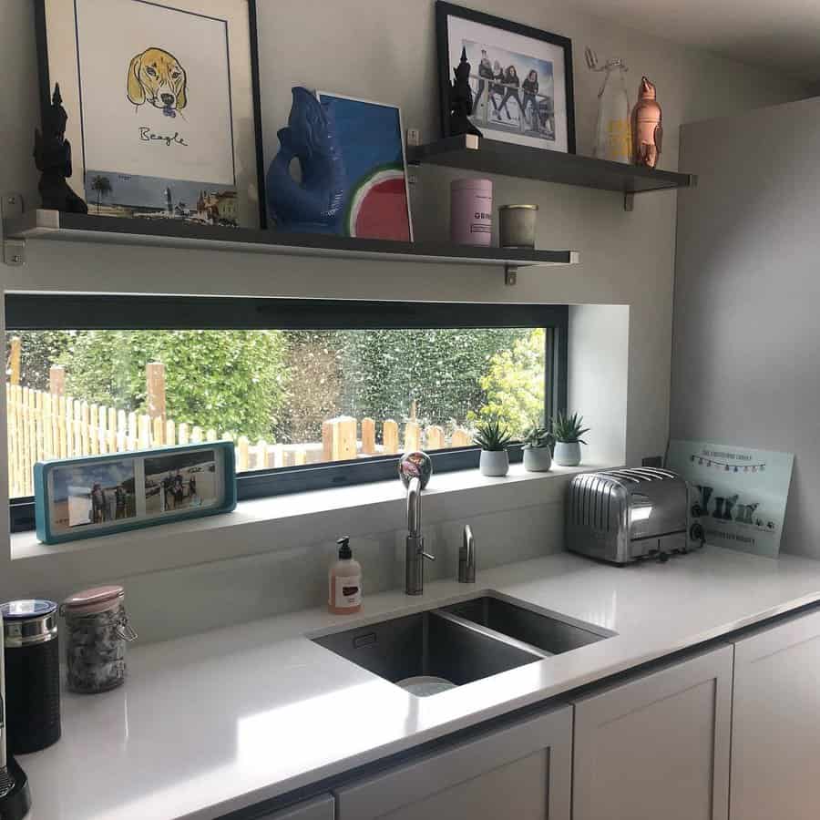 white kitchen with letterbox window