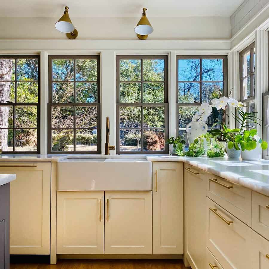 White kitchen with gold fixtures 