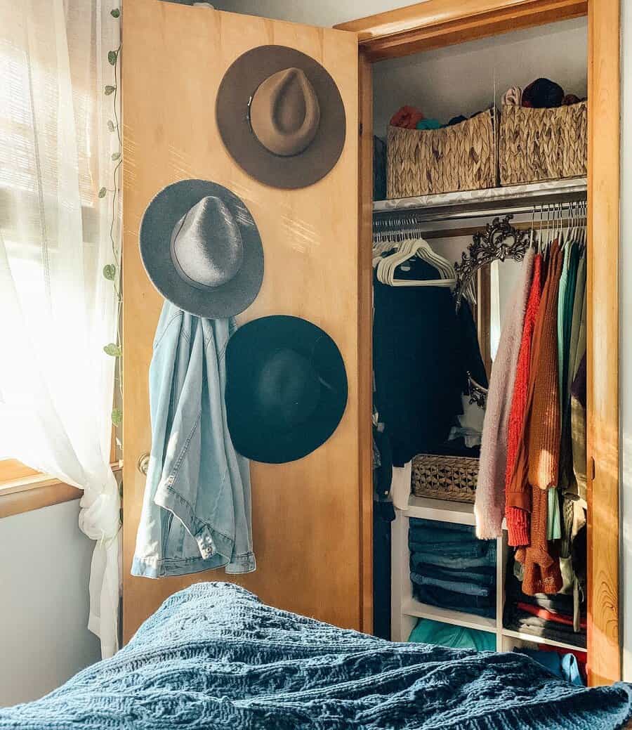 Closet door with hooks for hats 