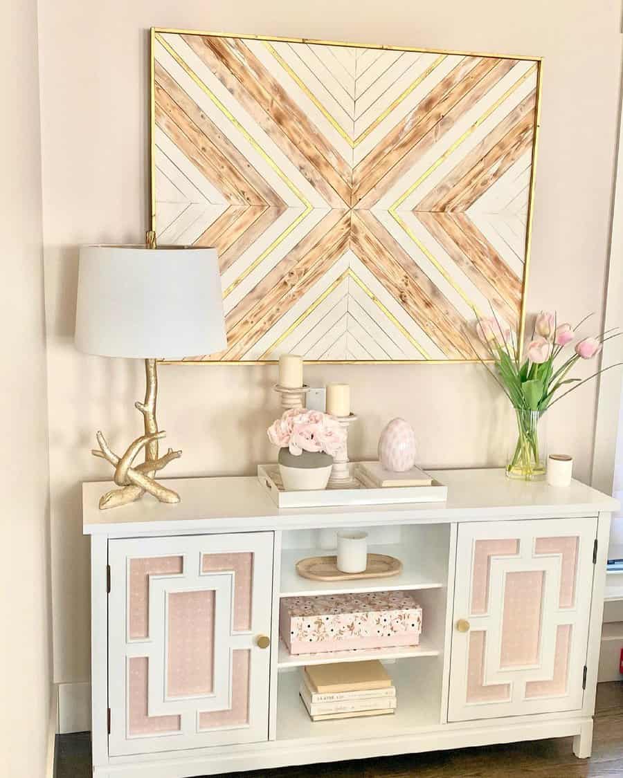 Elegant white console with pink and gold accents