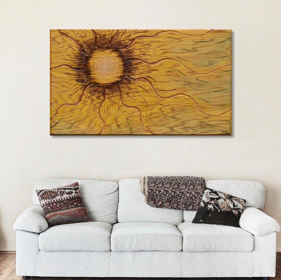 Bright sunflower artwork displayed on a wall