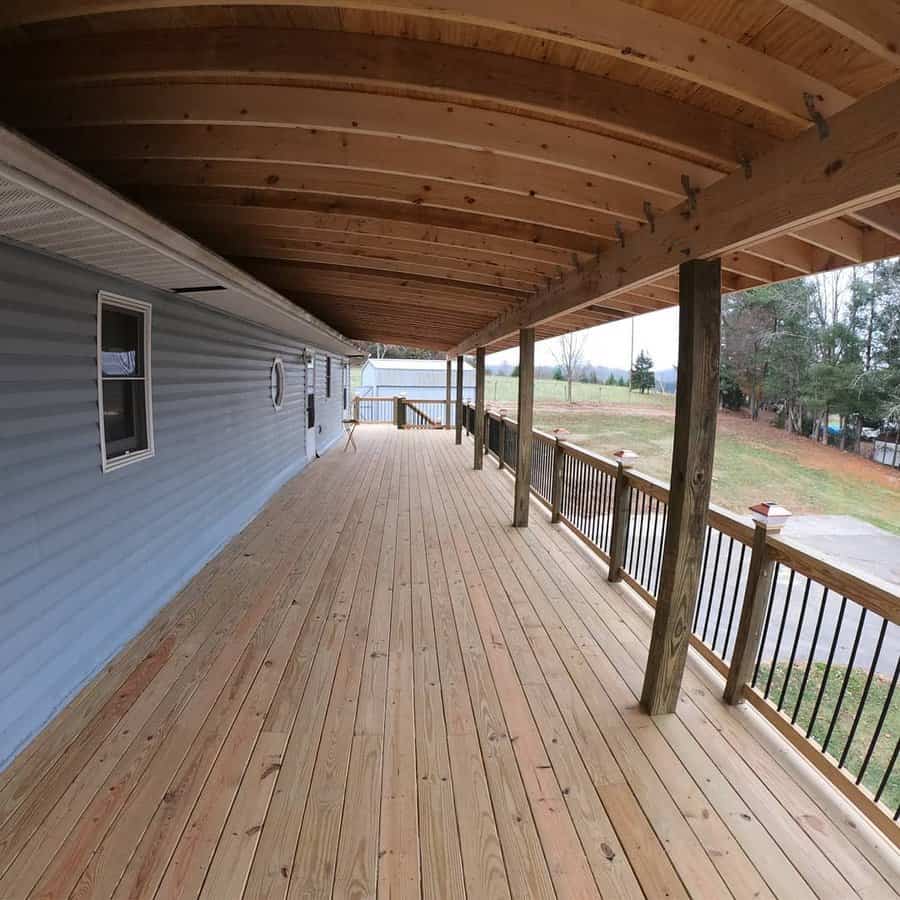 Covered deck with ceiling beams