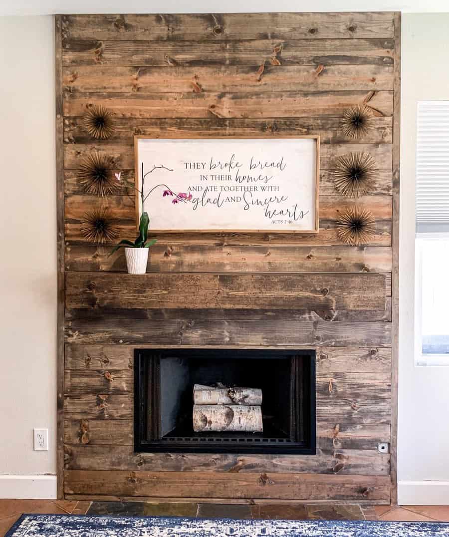 fireplace with distressed wood surround