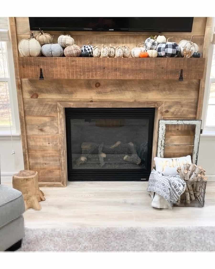 Distressed wood fireplace wall