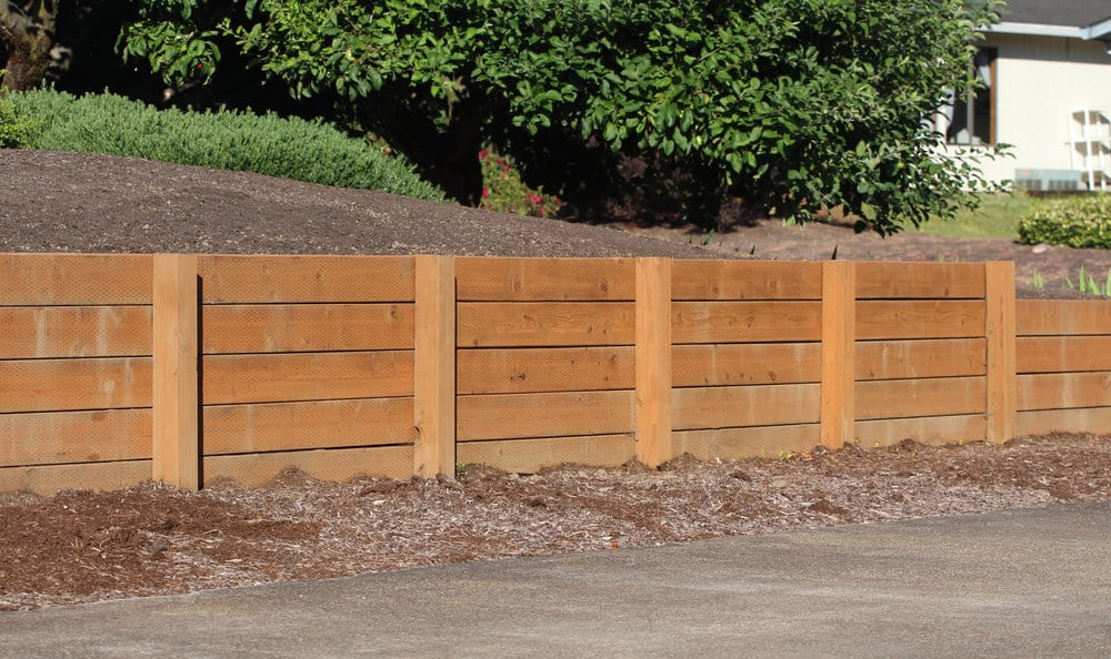 Railroad ties retaining wall