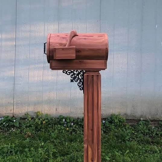 wood-carved mailbox