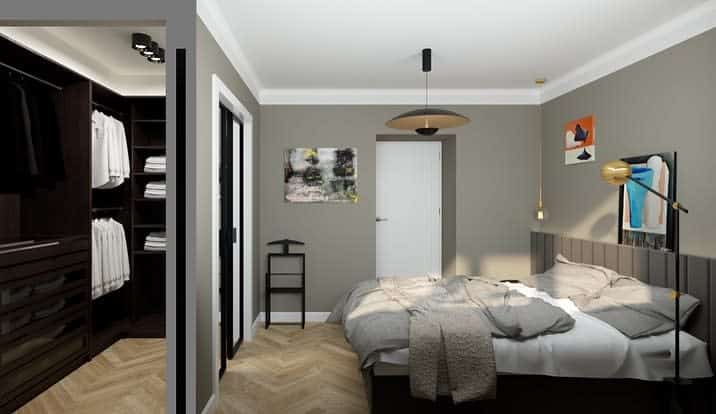 Modern bedroom with a messy bed, wall art, and a sliding closet. Neutral tones and herringbone flooring create a cozy atmosphere