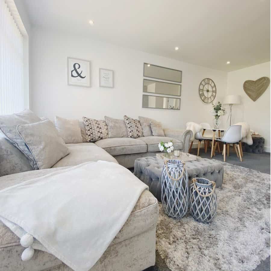 White living room with soft gray sofa