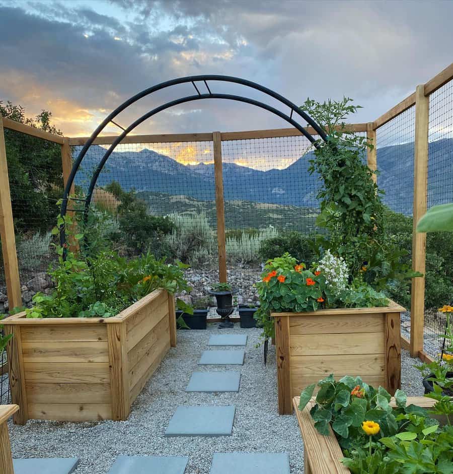 Garden arch over path with mountain view