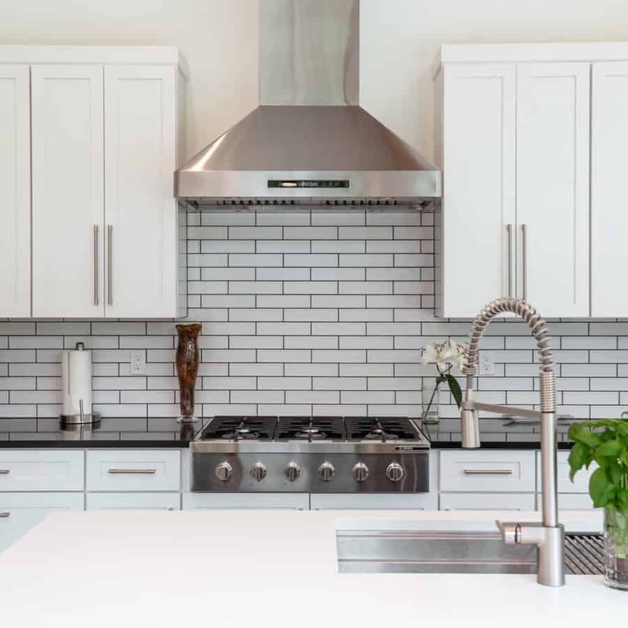 Modern small kitchen with tile backsplash