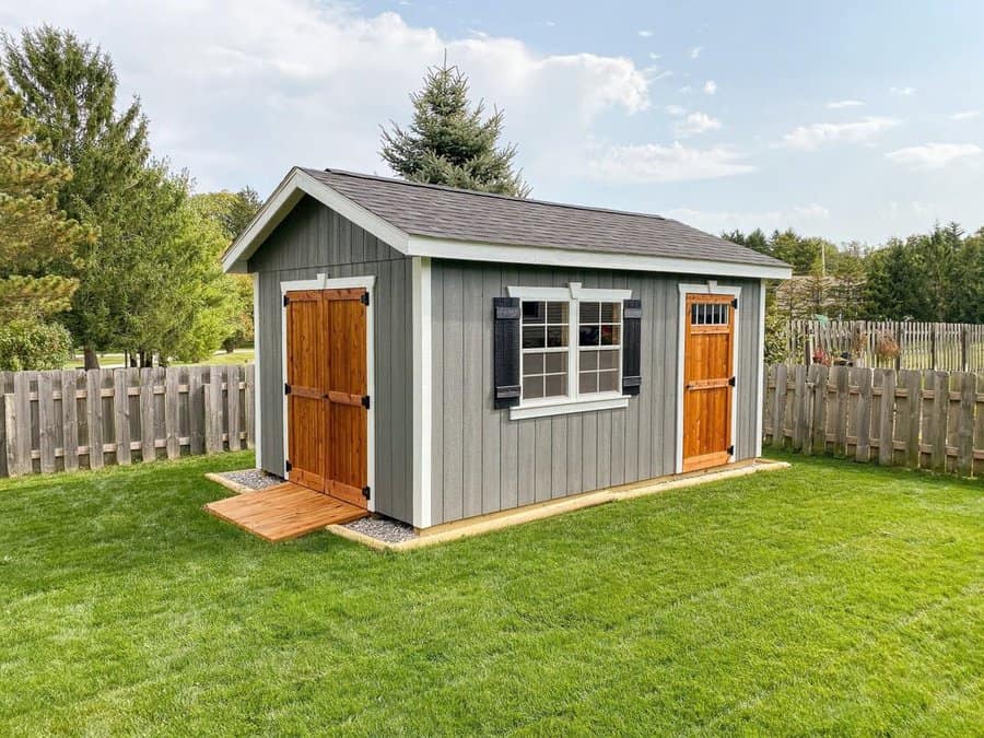 Garden shed with pebble bridge