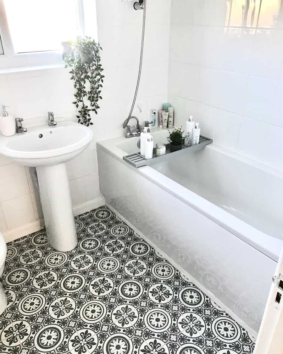 A petite bathroom with a predominantly white color scheme