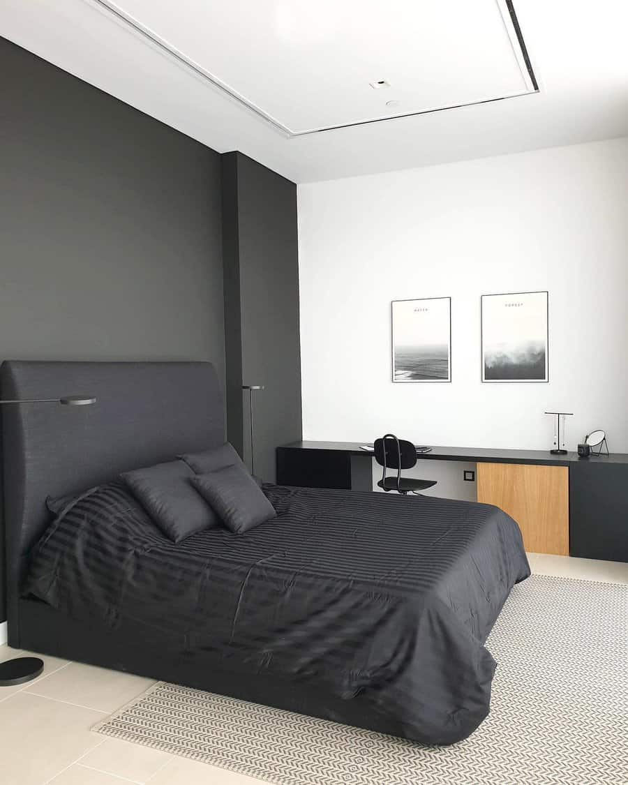 Minimalist bedroom with gray tones and framed artwork