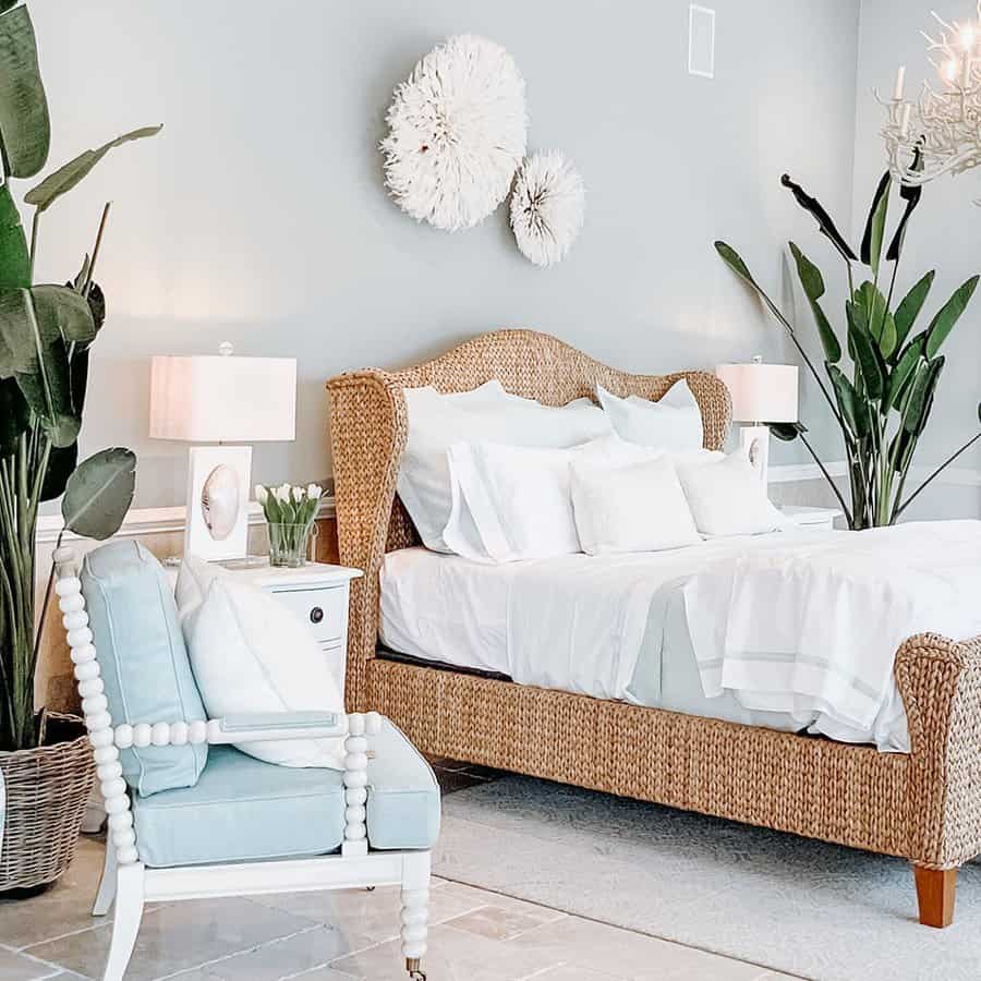 Bedroom with wicker bed and white furniture