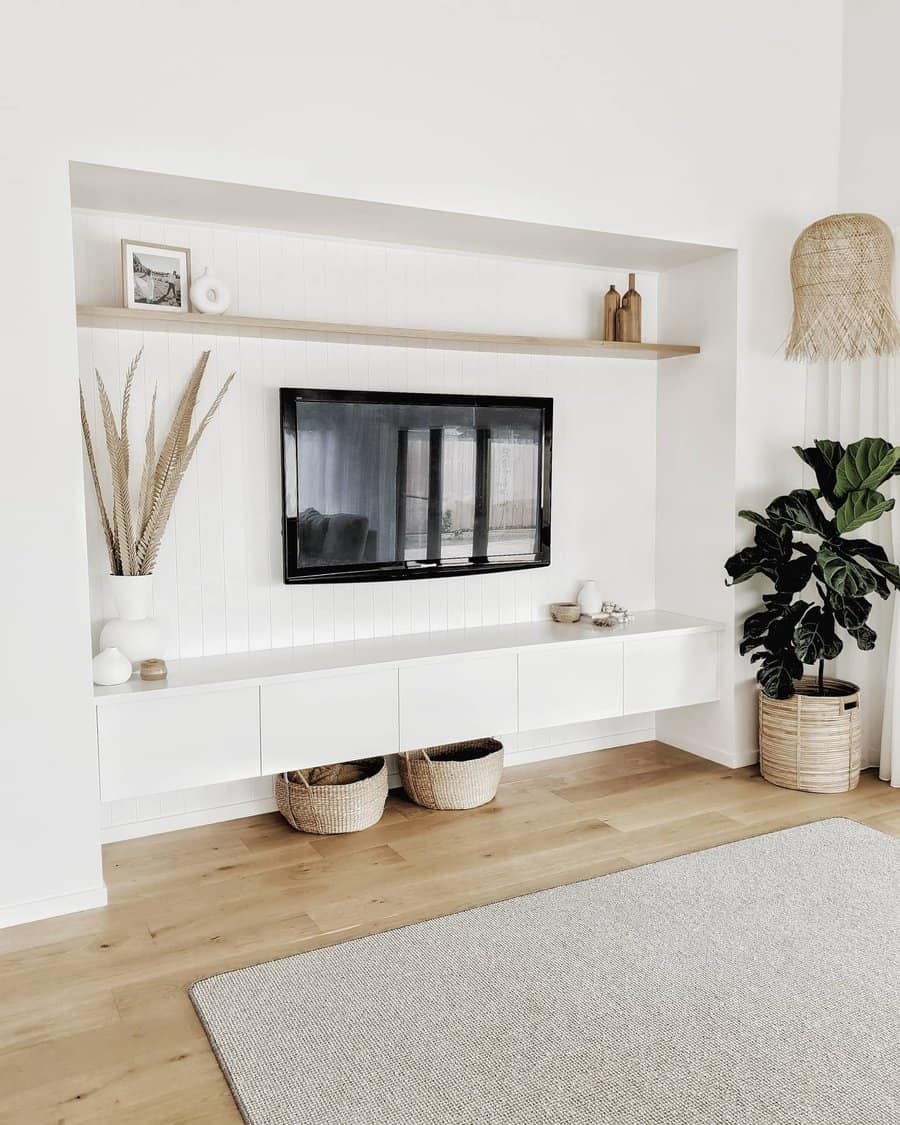 White living room with wicker basket and lush plant