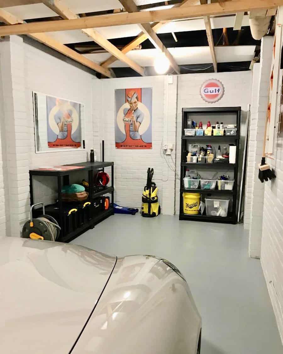 Clean garage interior with car and storage