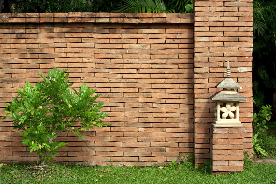 Exposed brick garden wall