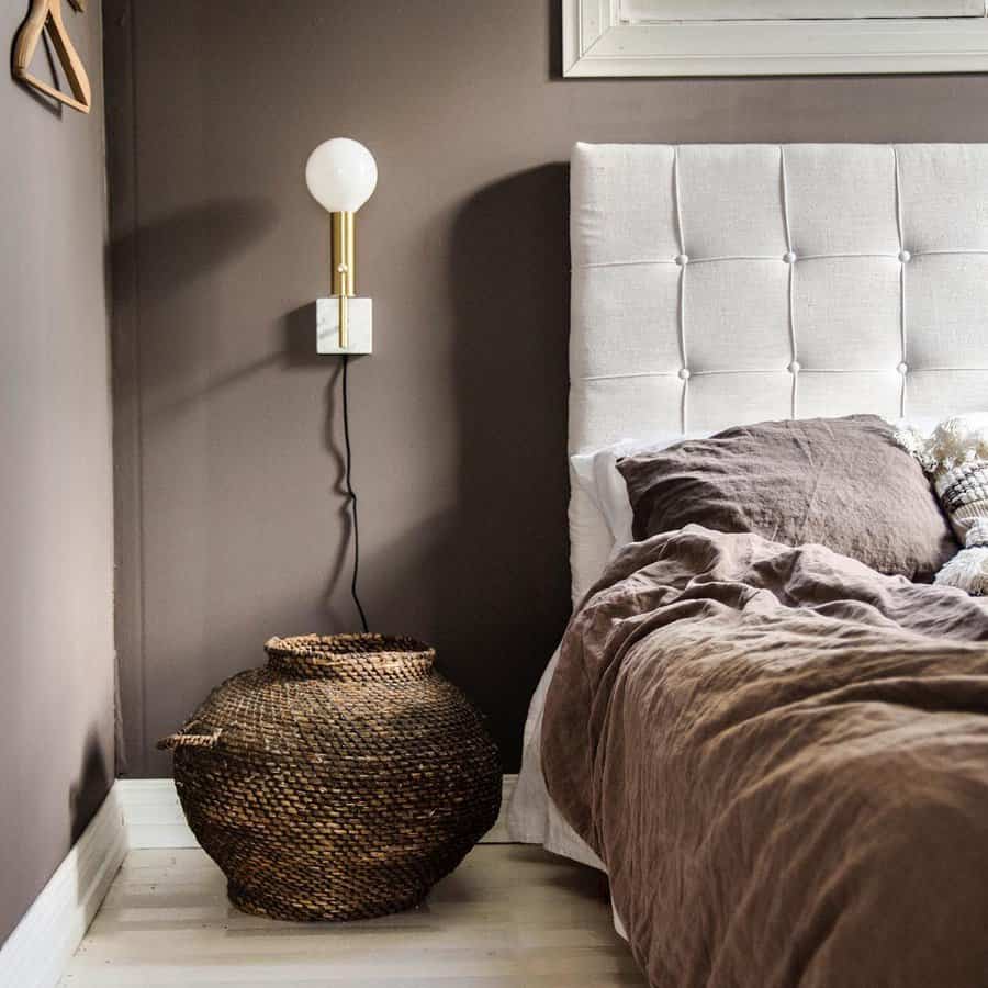 Earthy bedroom with grey walls and natural textures