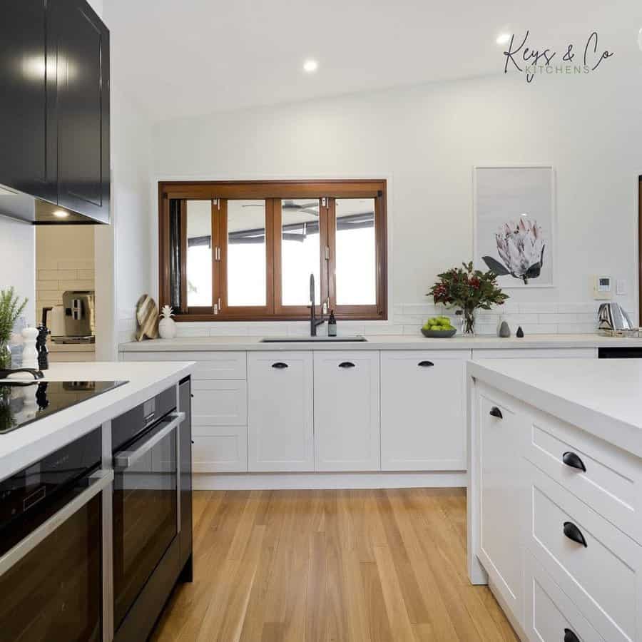 Small kitchen with white backsplash