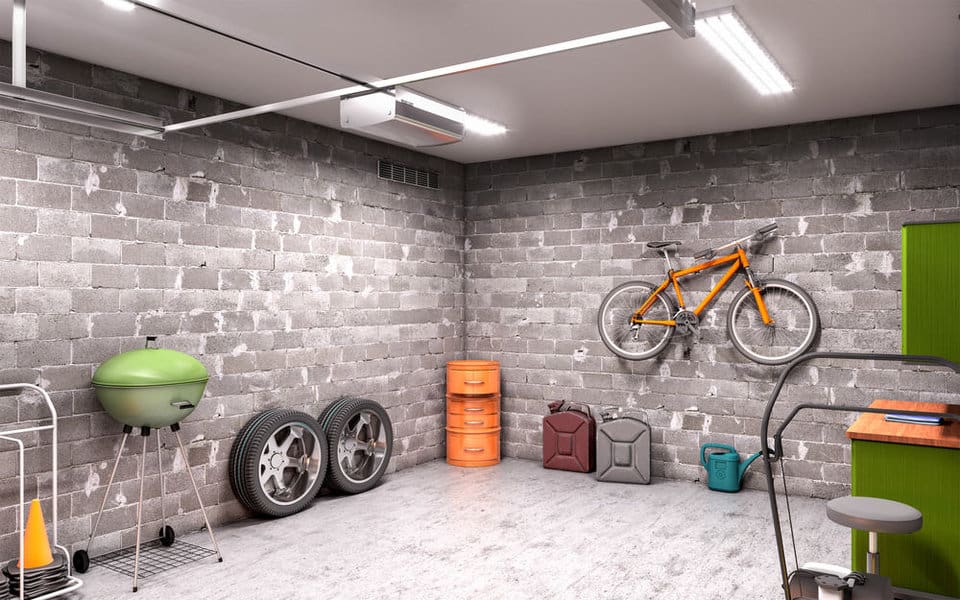 Organized garage with bike on wall and storage solutions