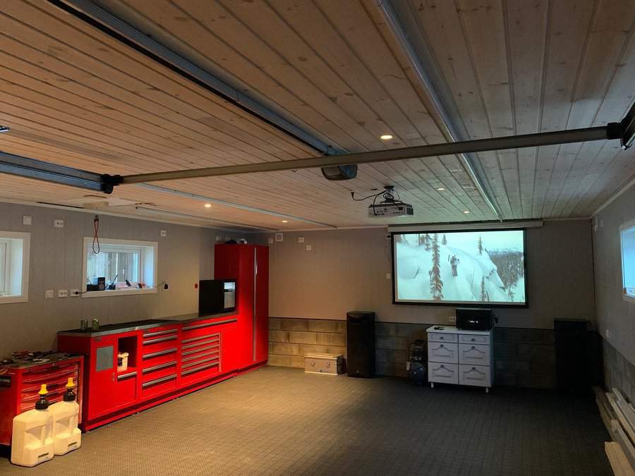 Garage converted to entertainment space with projector screen