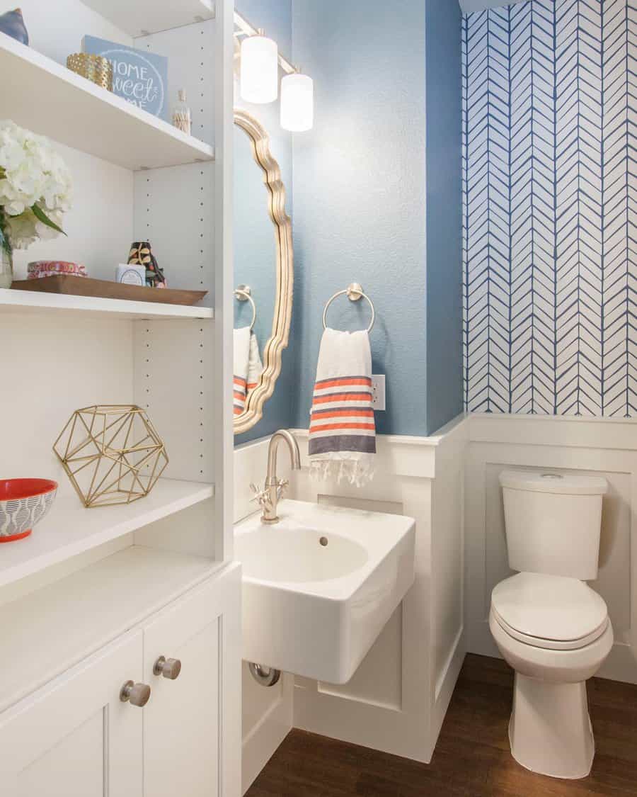 Bathroom with blue wallpaper design