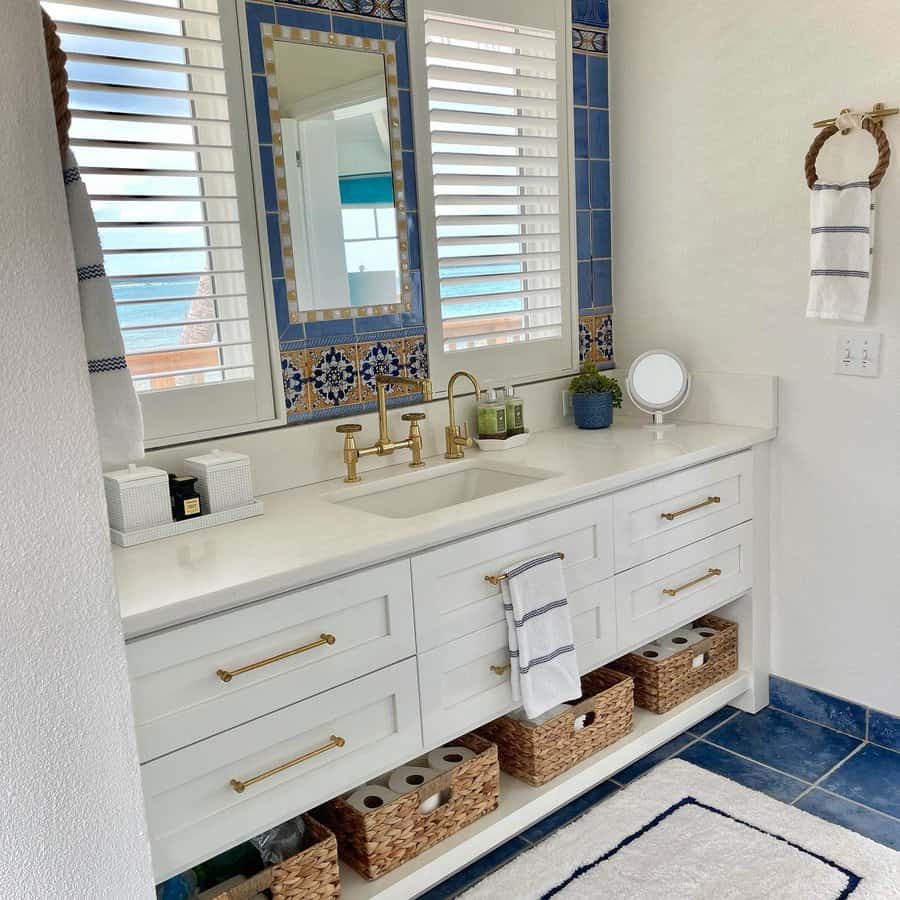 Bathroom with blue tile accent