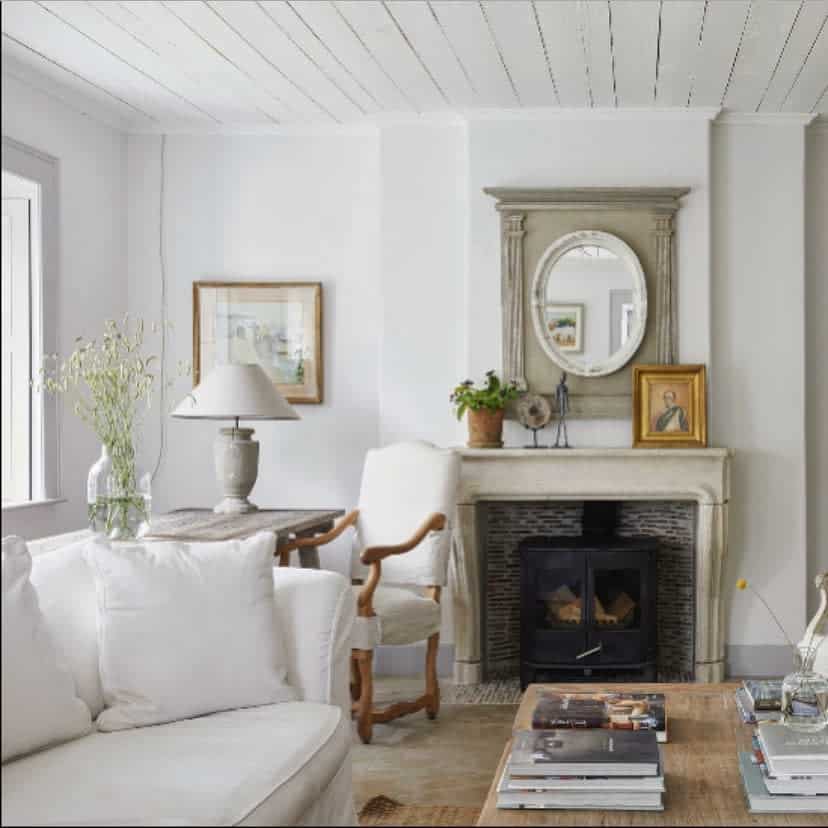 White living room with fireplace