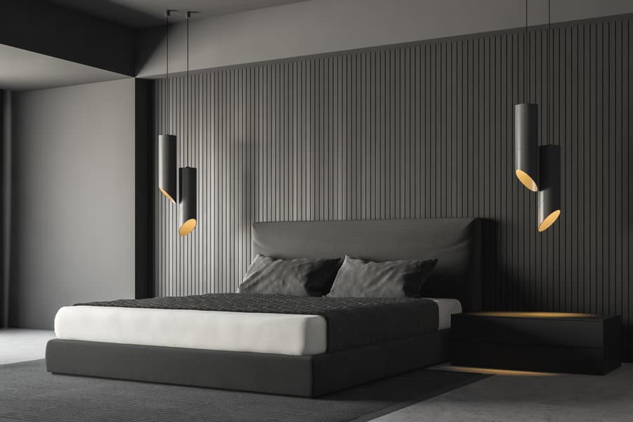 Modern monochromatic bedroom with sleek design and ambient lighting