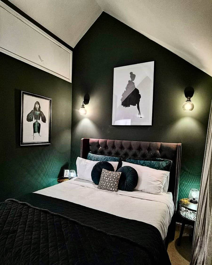 Dramatic bedroom with dark green walls and chic art