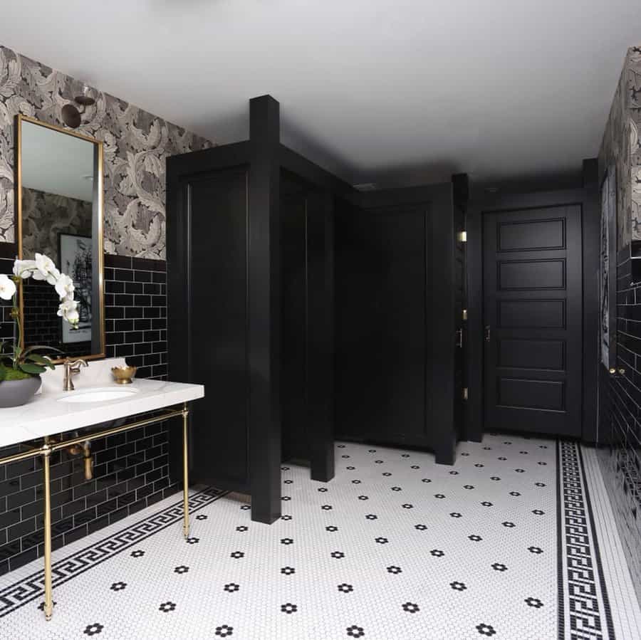 black bathroom with white vanity