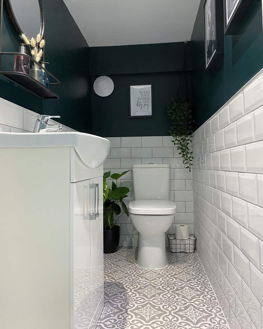 small bathroom with dark green wall with beveled tiles