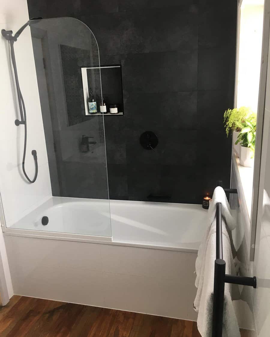 small bathroom with black wall