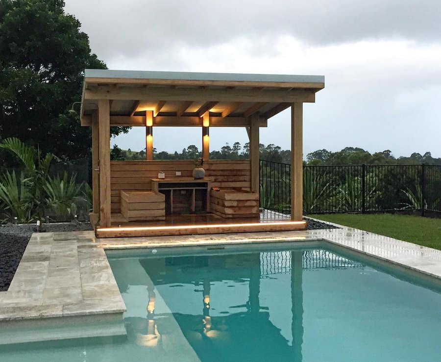 Cozy poolside cabana with lighting