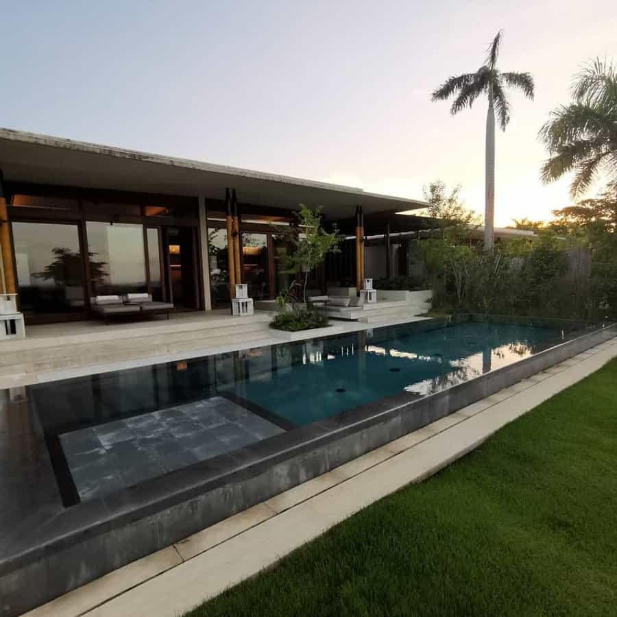 Modern poolside retreat at twilight