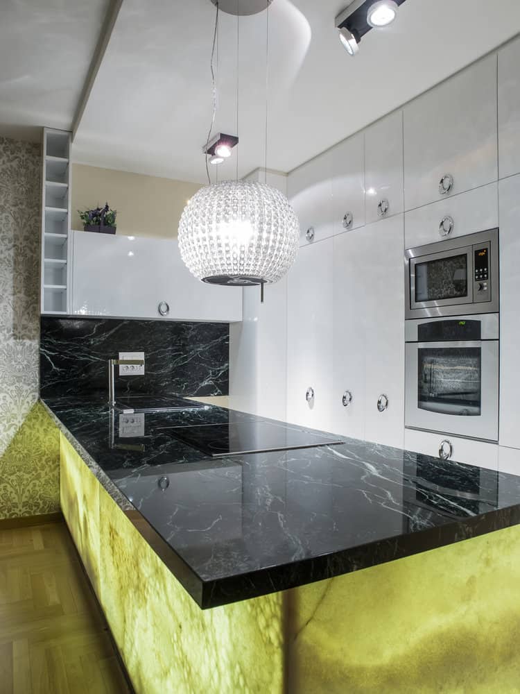 Chic kitchen with disco ball pendant