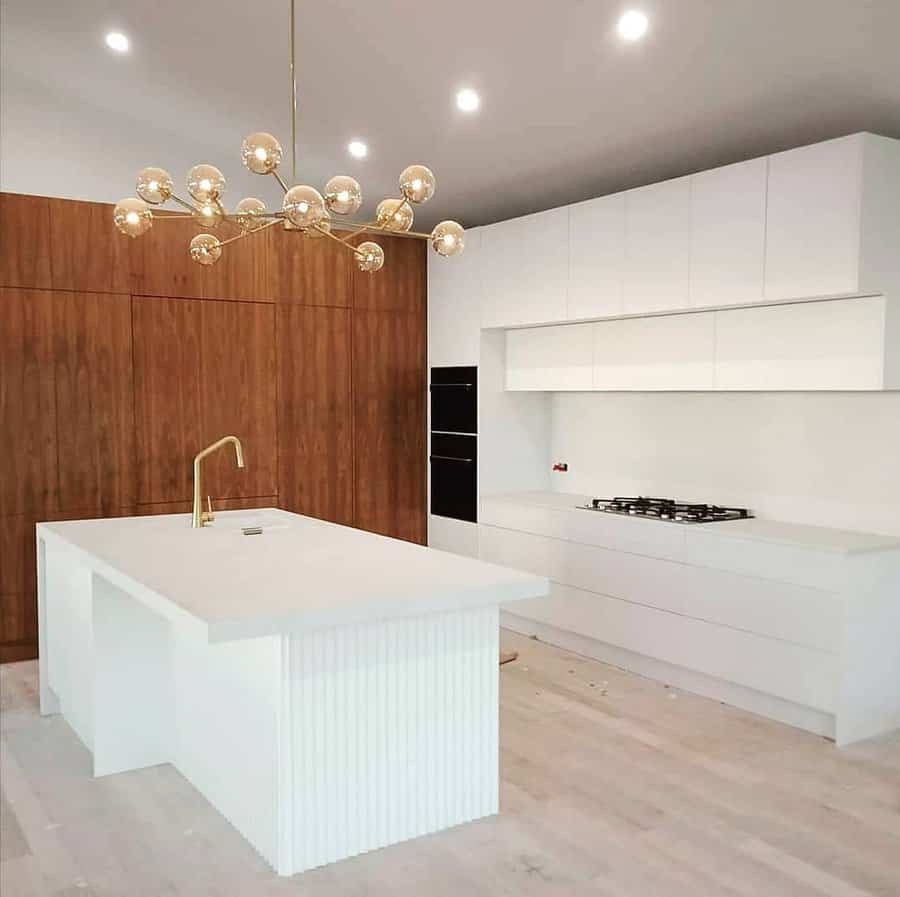 Minimalist kitchen with orb chandelier