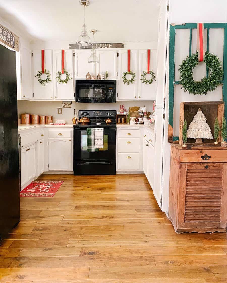 Cozy decorated kitchen with festive wreaths