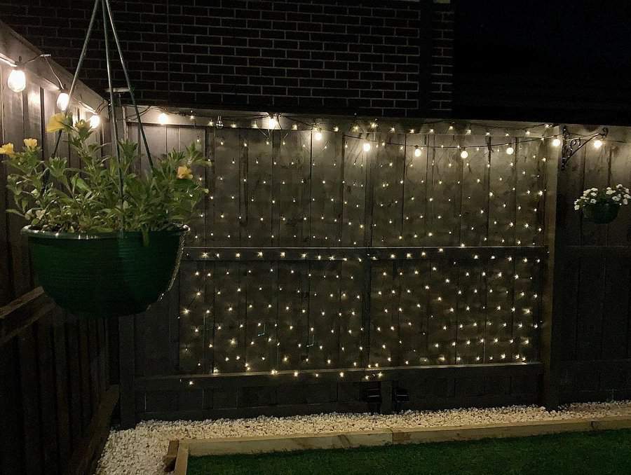 Outdoor wall with curtain lights