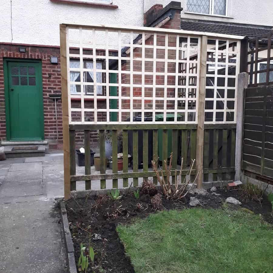 New trellis fence in a residential garden