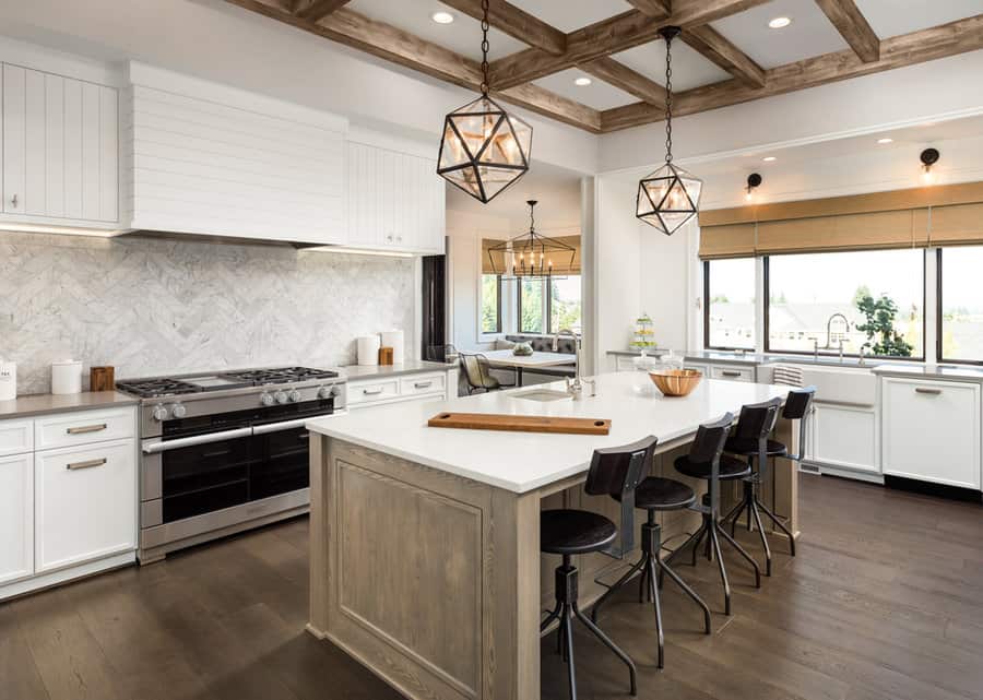 Rustic chic kitchen with geometric pendants and wood beams