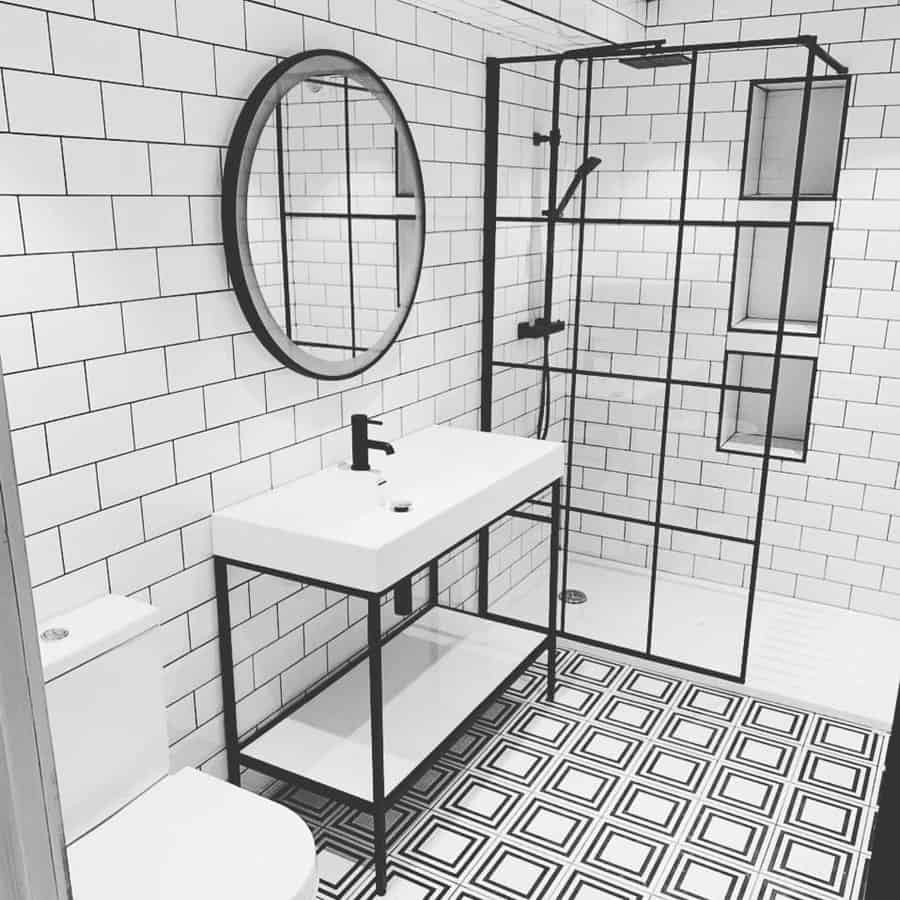 black and white bathroom with graphic tiles 