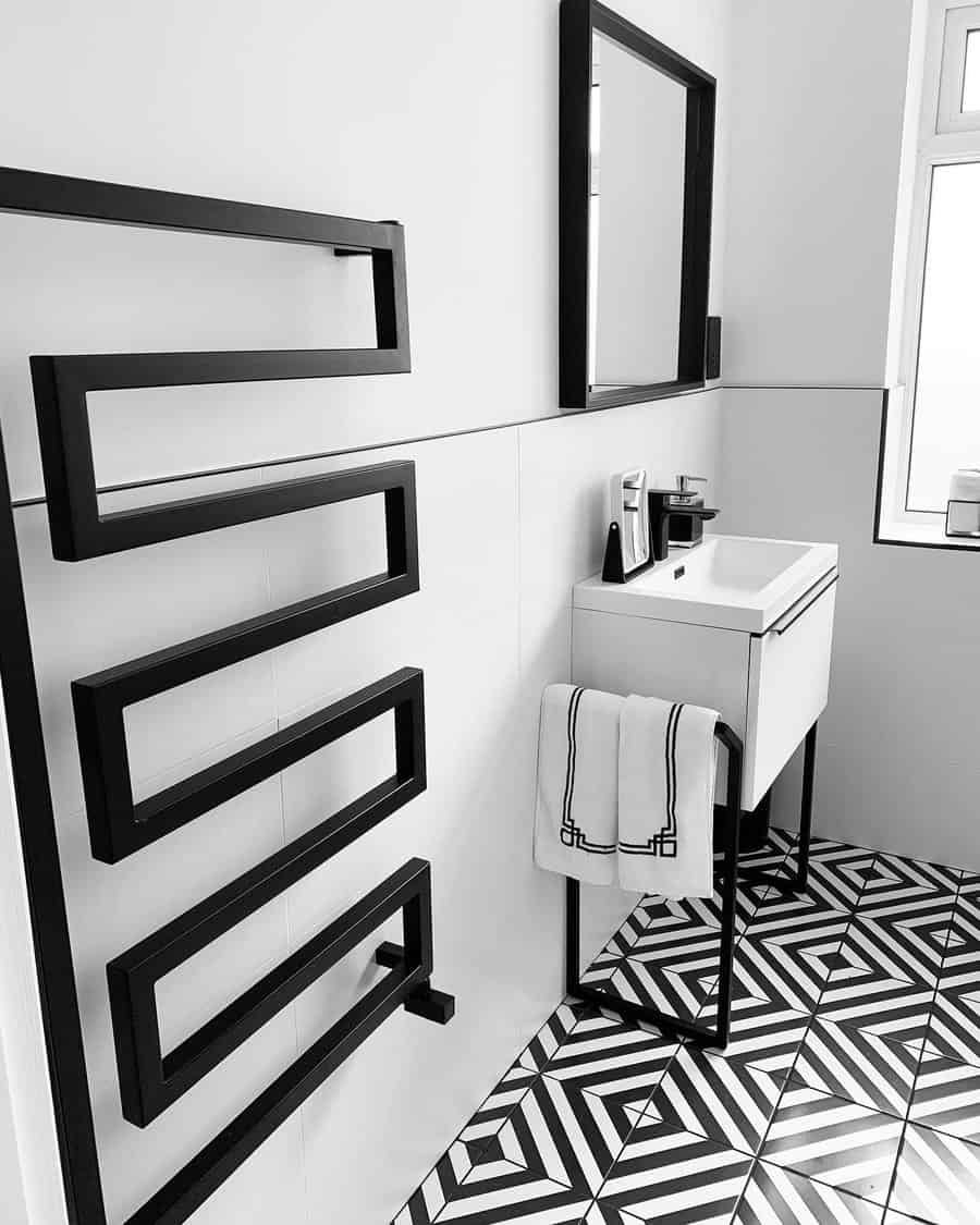 bathroom with bold black framed mirror 
