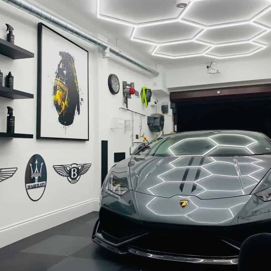 Luxury car in a modern garage with artistic light fixtures